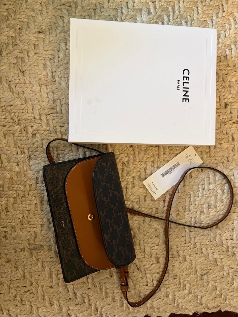 DUO WALLET ON STRAP IN TRIOMPHE CANVAS AND CALFSKIN